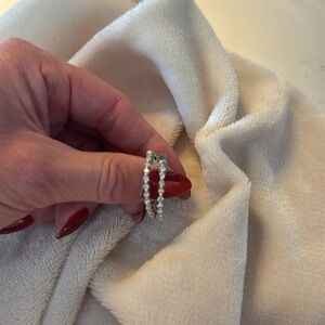 14 Kt White Gold Diamond Earrings In Out Total Carat wt 0.76 diamonds